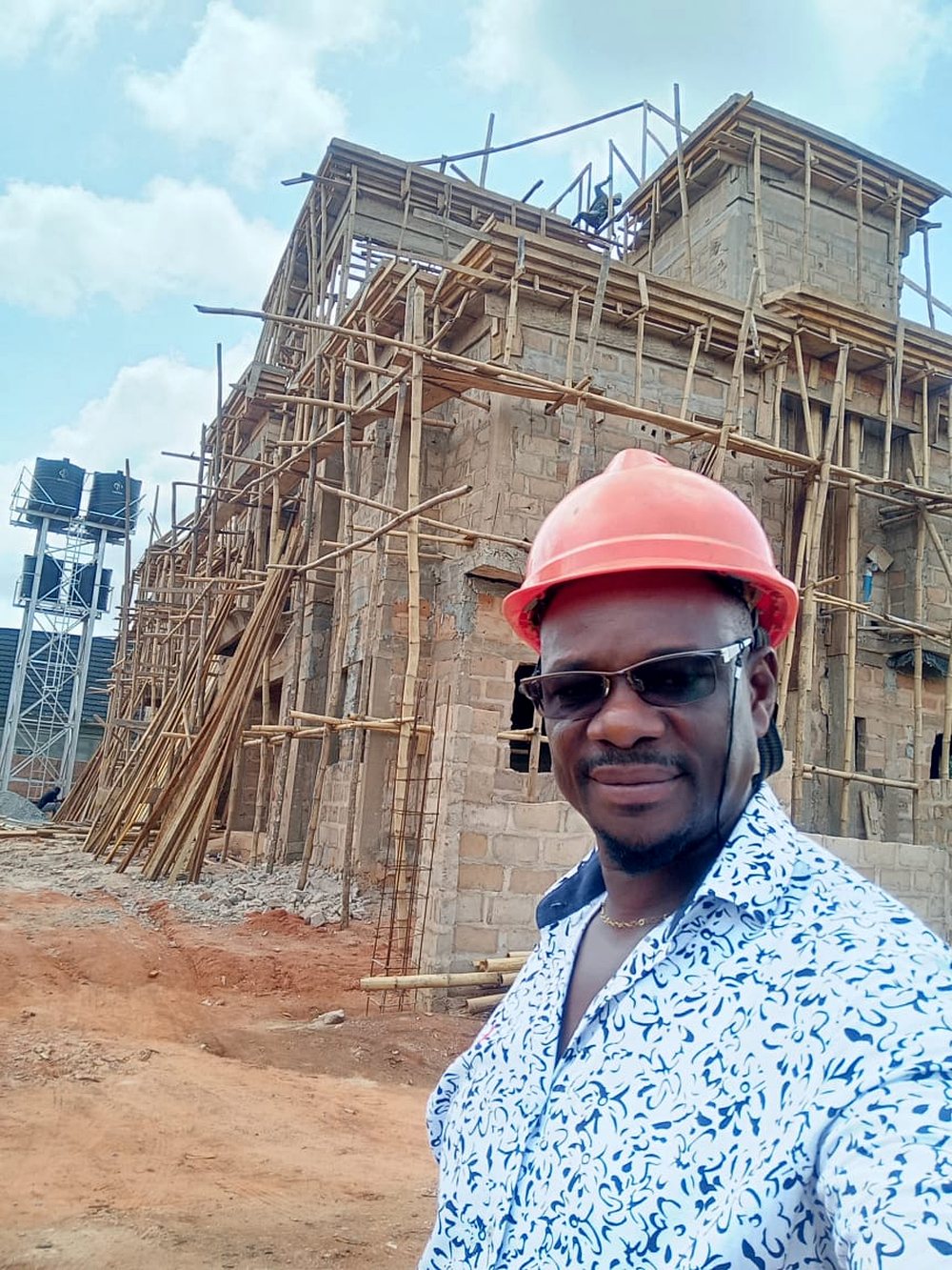Engr. Tony K. Erhunse supervising a two-storey residential build
