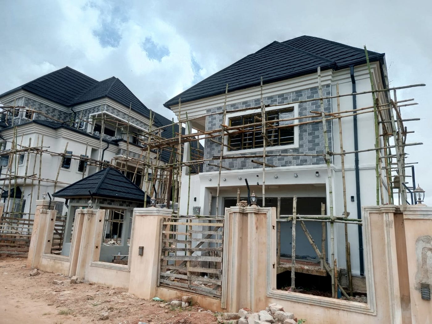 Ighaen Road Apartments — stone cladding and roof tiles